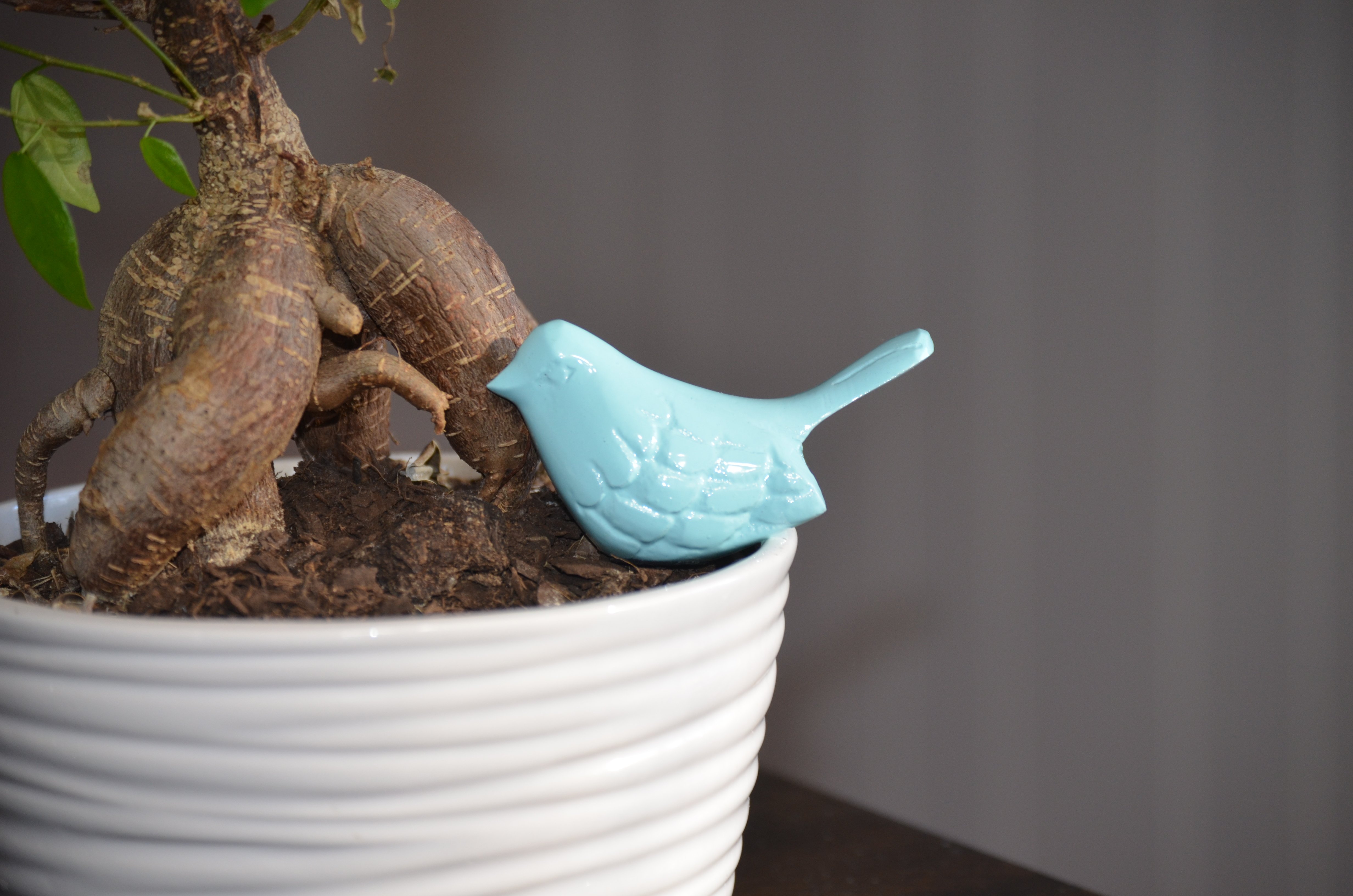 Vibhsa Bird Figurines in sea green, handcrafted aluminum decor symbolizing health and happiness, perfect for home or office.