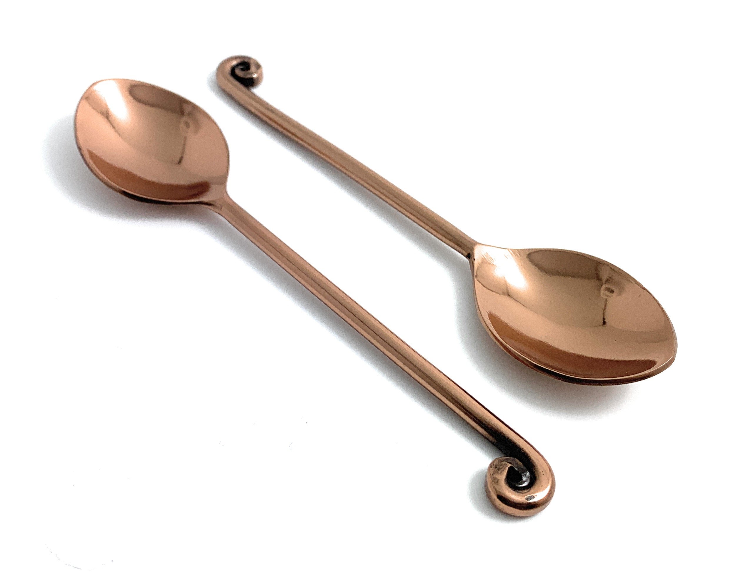 Set of 6 Vibhsa stainless steel teaspoons with copper coating, featuring a dark rose gold polish, ideal for dining and kitchen decor.