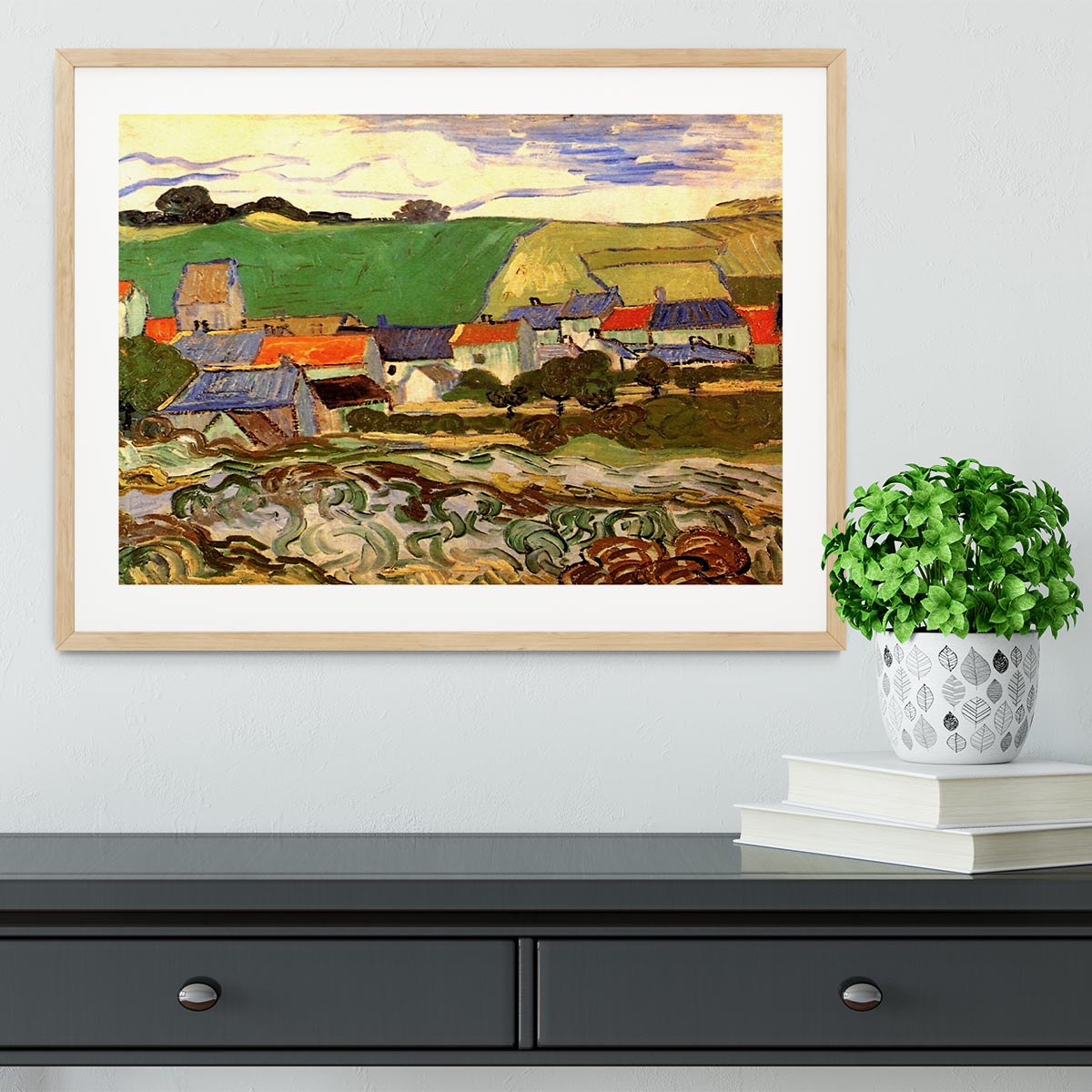Framed print of Van Gogh's View of Auvers, showcasing vibrant colors and quality craftsmanship in a stylish frame.