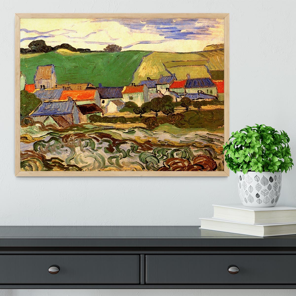 Framed print of Van Gogh's View of Auvers, showcasing vibrant colors and quality craftsmanship in a stylish frame.