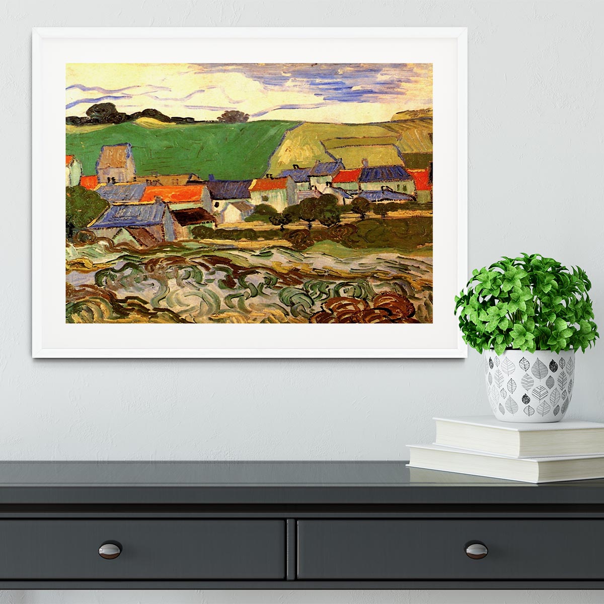 Framed print of Van Gogh's View of Auvers, showcasing vibrant colors and quality craftsmanship in a stylish frame.