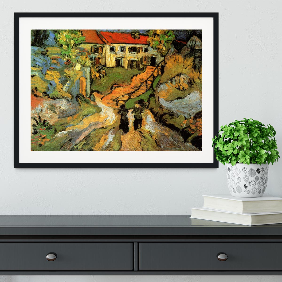 Framed artwork of Van Gogh's Village Street and Steps in Auvers featuring two figures, showcasing vibrant colors and quality craftsmanship.