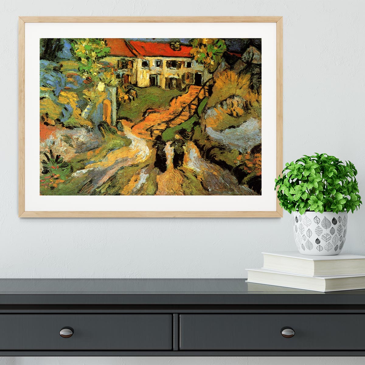 Framed artwork of Van Gogh's Village Street and Steps in Auvers featuring two figures, showcasing vibrant colors and quality craftsmanship.