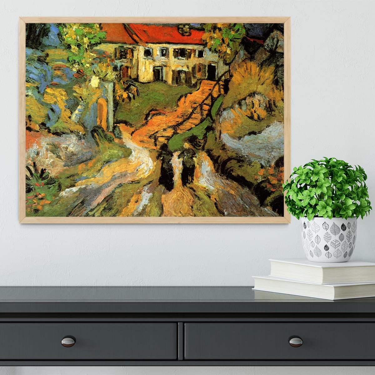 Framed artwork of Van Gogh's Village Street and Steps in Auvers featuring two figures, showcasing vibrant colors and quality craftsmanship.