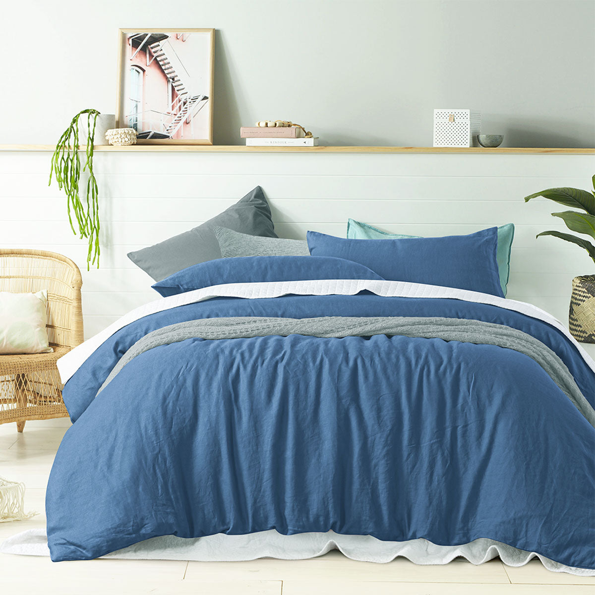 Vintage Design Homewares 100% Linen Brilliant Blue Quilt Cover Set displayed on a neatly made bed, showcasing its elegant color and texture.