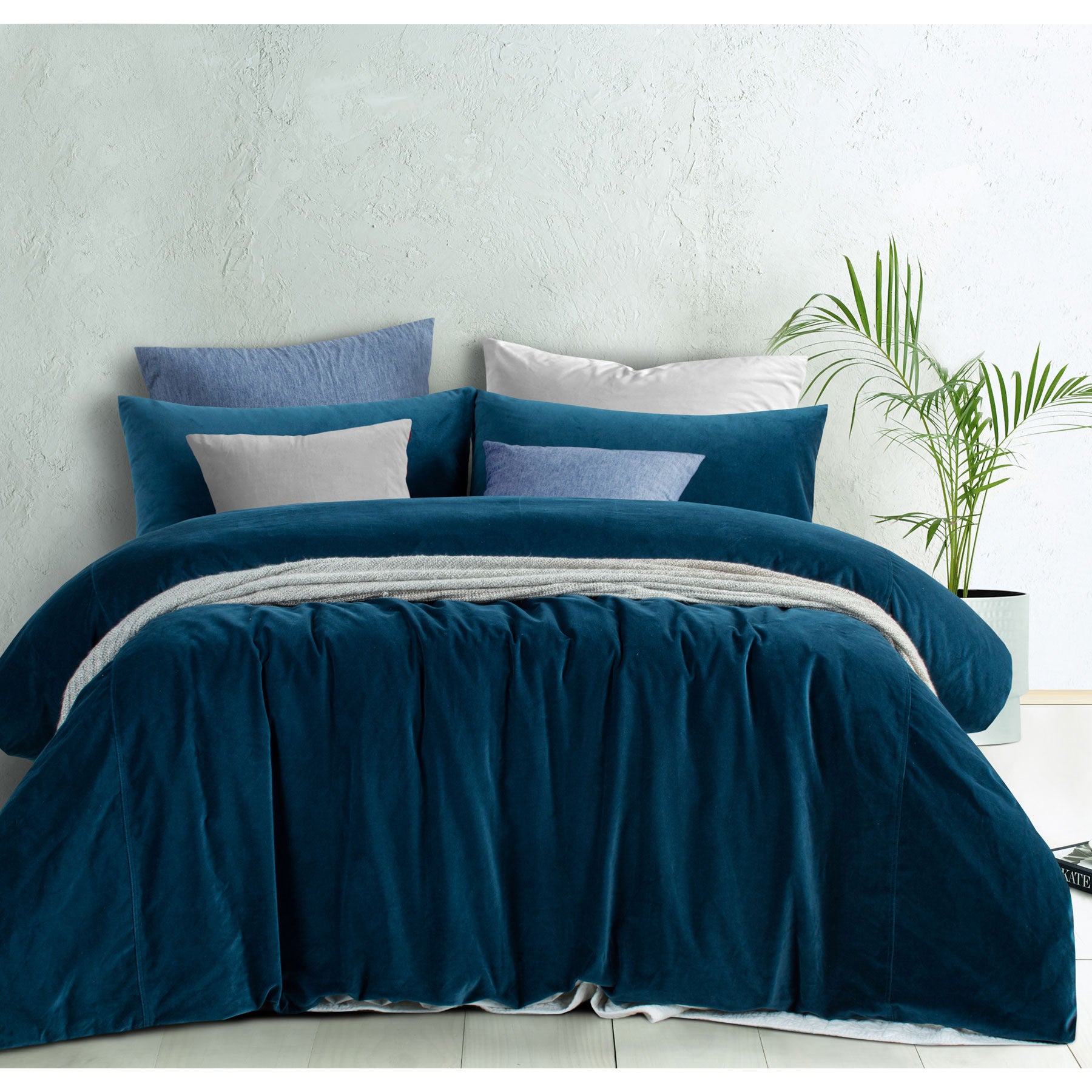 Riverland Blue Cotton Velvet Quilt Cover Set displayed on a bed, showcasing its luxurious texture and deep blue color.