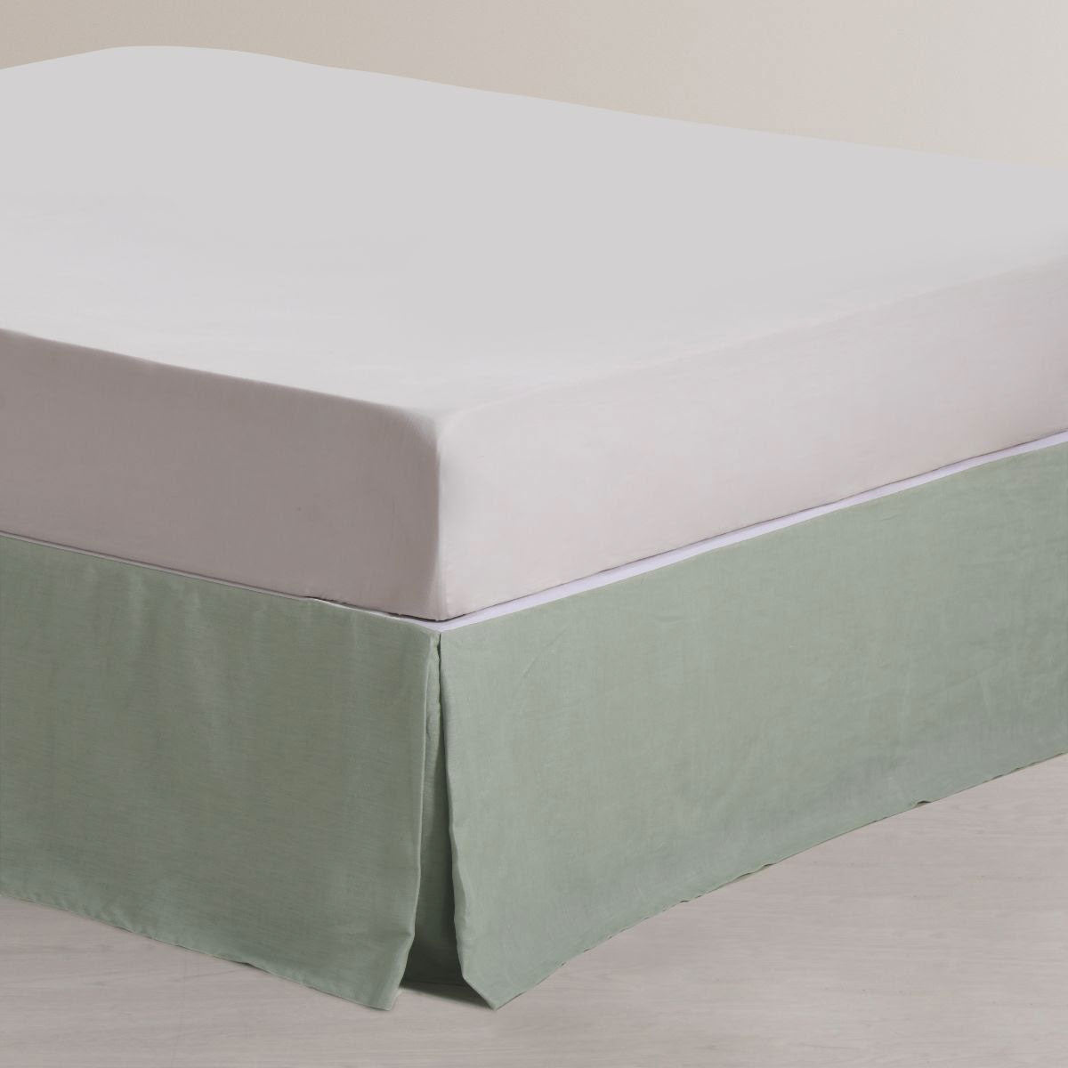 Sage French Linen Valance by Vintage Design Homewares, elegantly draped over a king-sized bed, showcasing its soft color and quality fabric.