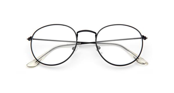 Vintage Oval Gold Eyeglass Frame showcasing a stylish metal design suitable for both men and women.