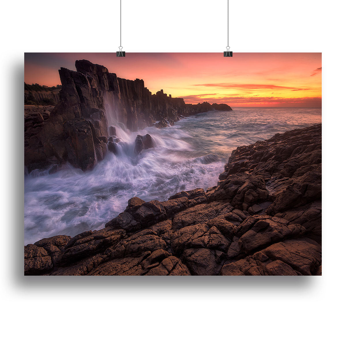 A beautiful canvas print featuring a serene coastal scene with waves and a clear sky, perfect for home decor.
