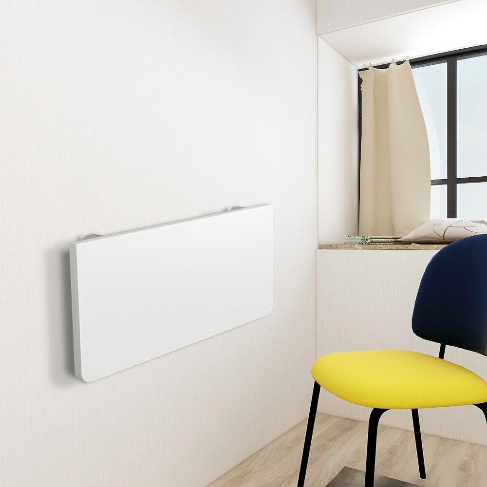 Wall Mounted Floating Computer Desk in black and white, showcasing its sturdy design and compact size, ideal for home office use.