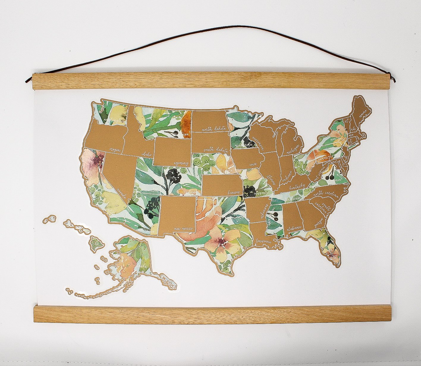 Wanderframe Magnetic Hanging Frame displaying a Scratch Your Travel Map, featuring teak wood and vegan leather string.