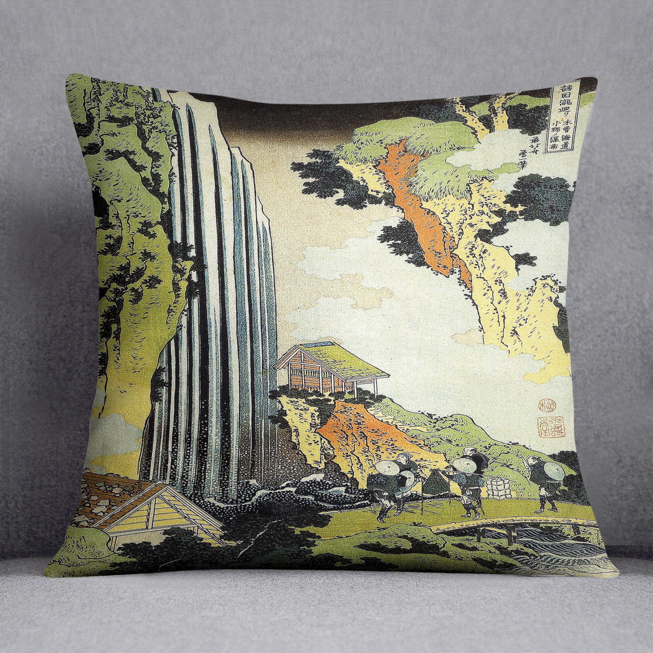 A vibrant cushion featuring an abstract design inspired by Hokusai's Waterfall, made from luxurious vegan faux suede.