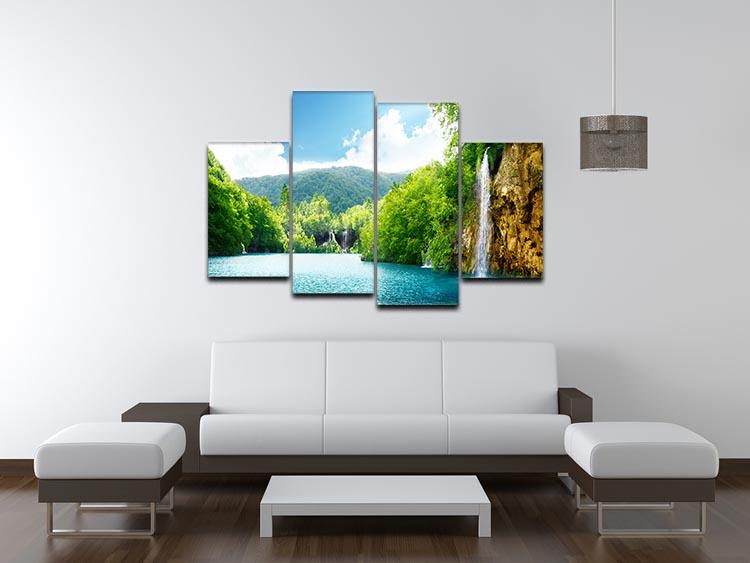 A beautiful 4 split panel canvas artwork depicting a serene waterfall in a lush green forest, showcasing vibrant colors and intricate details.