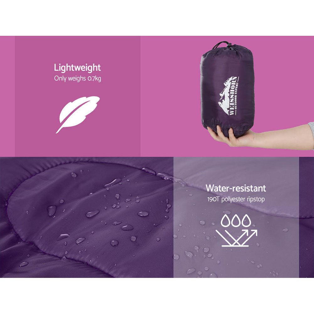 Weisshorn Sleeping Bag for kids in pink, designed for camping and hiking, featuring a soft lining and adjustable strap.