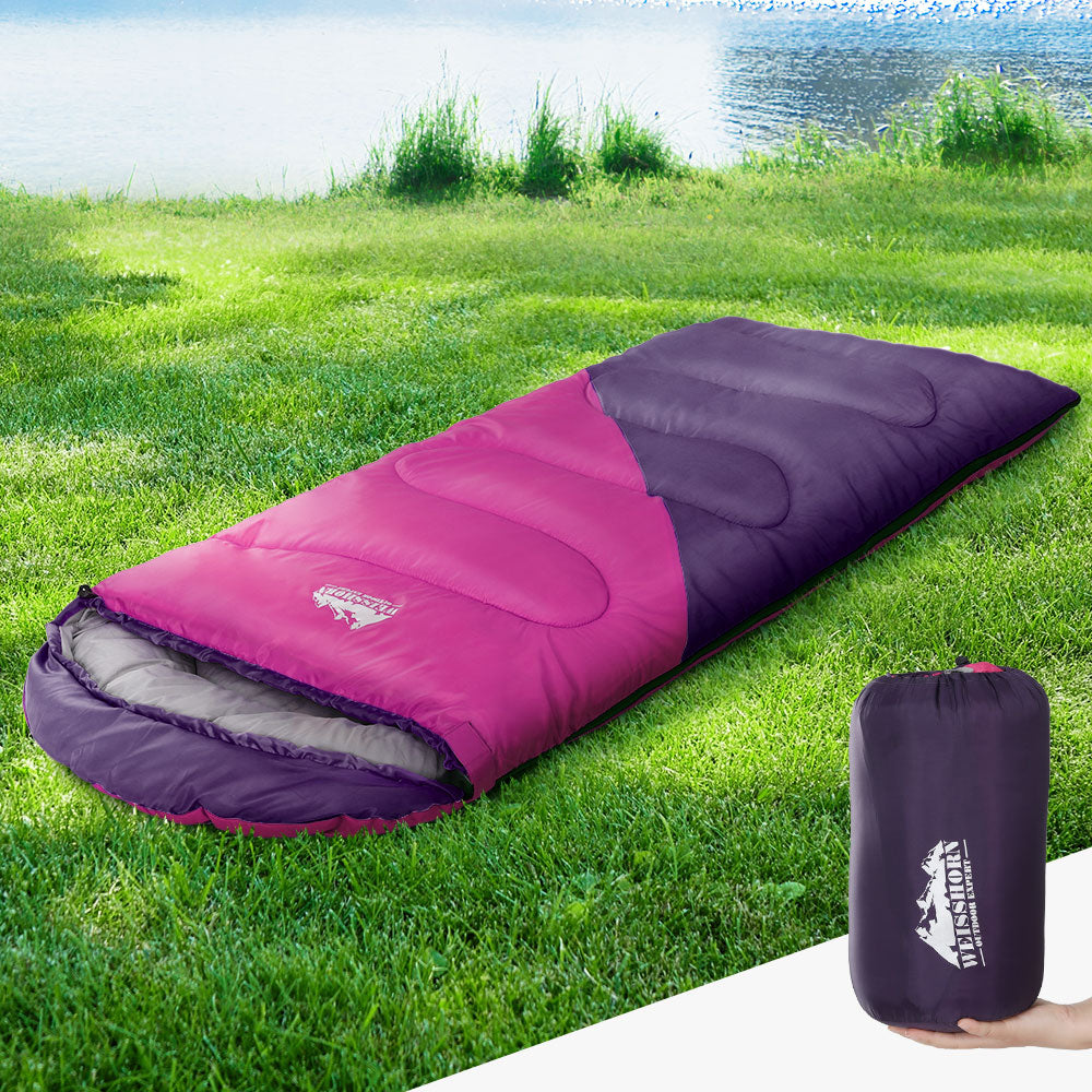 Weisshorn Sleeping Bag for kids in pink, designed for camping and hiking, featuring a colorful design and lightweight, water-resistant material.