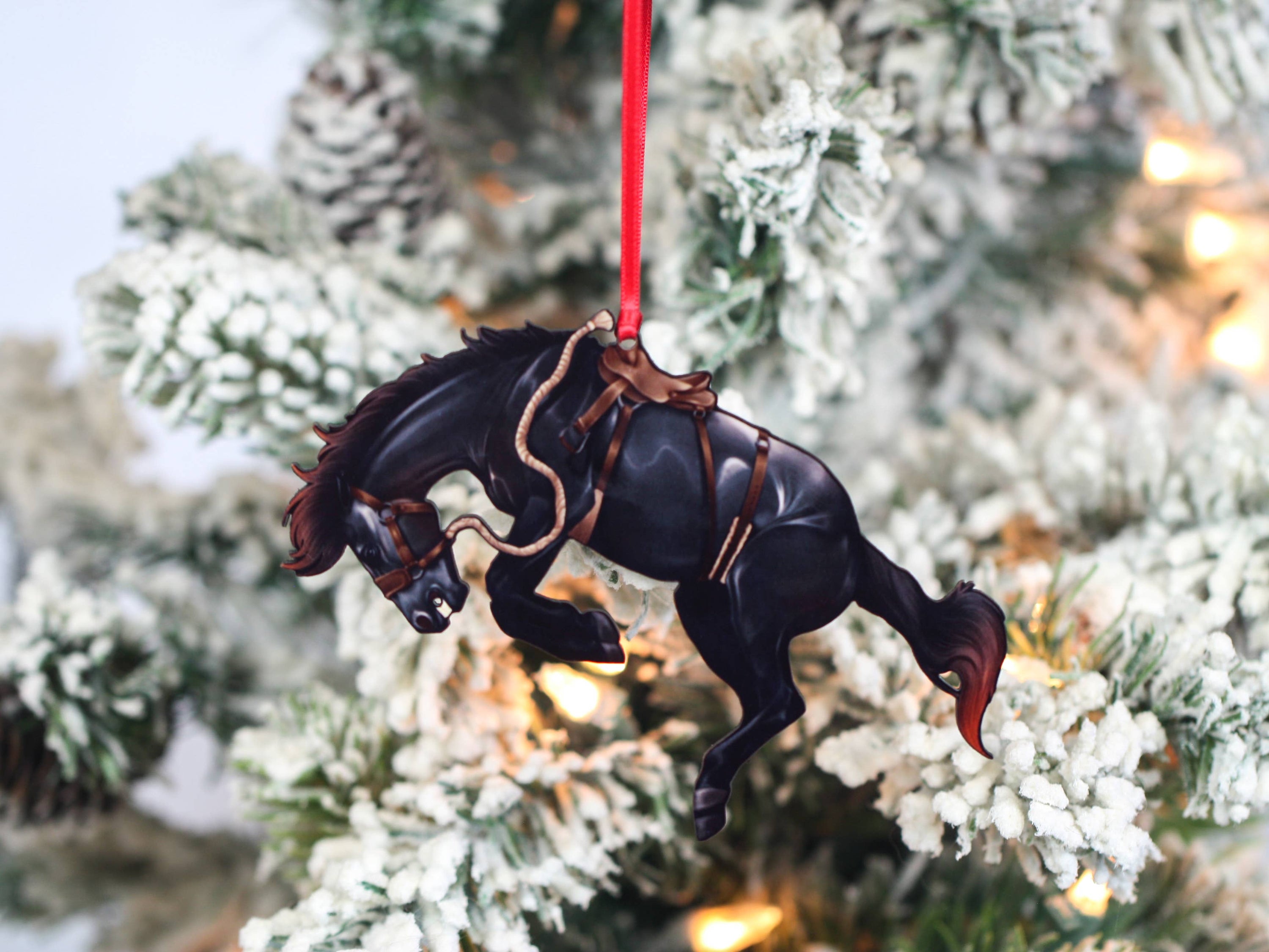 Western Black Rodeo Bucking Horse Bronco Ornament made of composite wood, showcasing intricate laser-cut details and glossy finish.