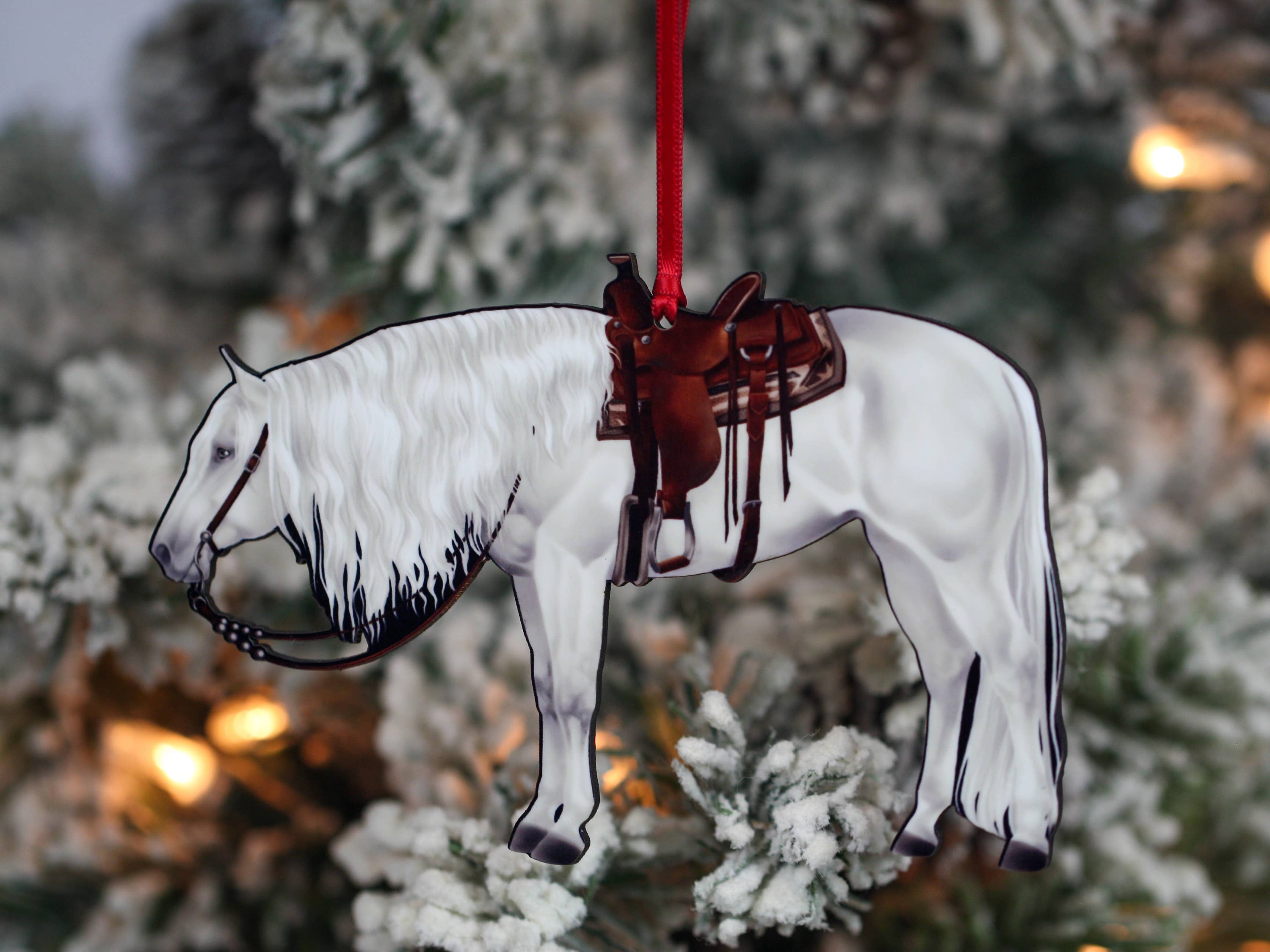 A beautifully crafted white/light gray Quarter Horse ornament made from composite wood, showcasing intricate details and a glossy finish.