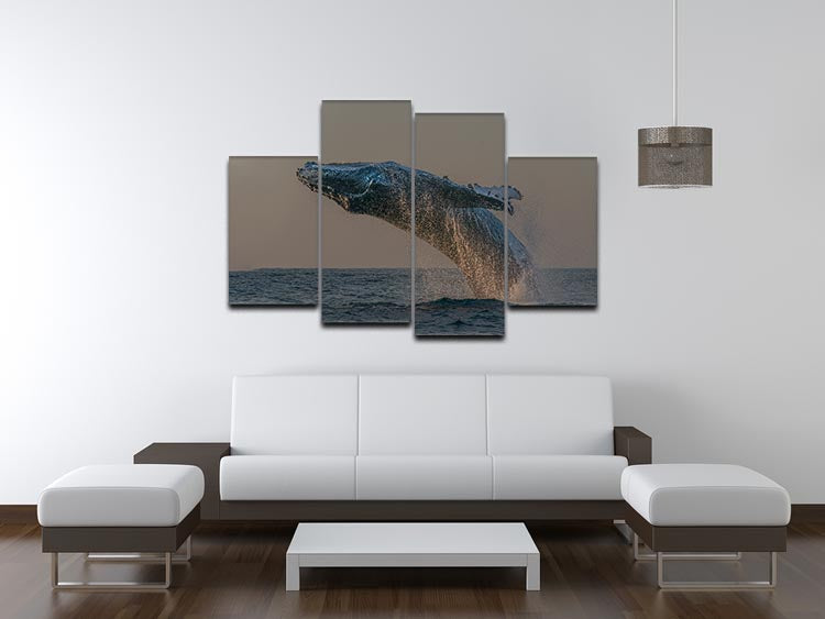 A stunning 4-panel canvas artwork depicting a whale flipping out of the ocean, showcasing vibrant colors and dynamic design.