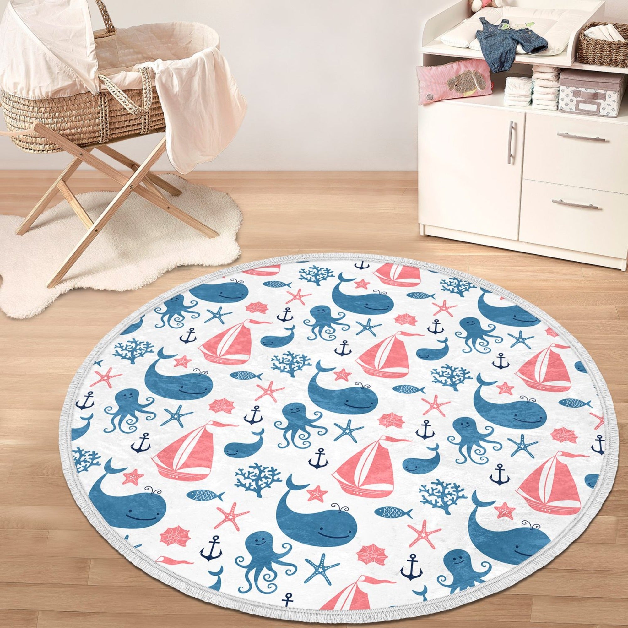 Whale printed round rug designed for nursery rooms, featuring a vibrant marine design and soft velvet fabric.