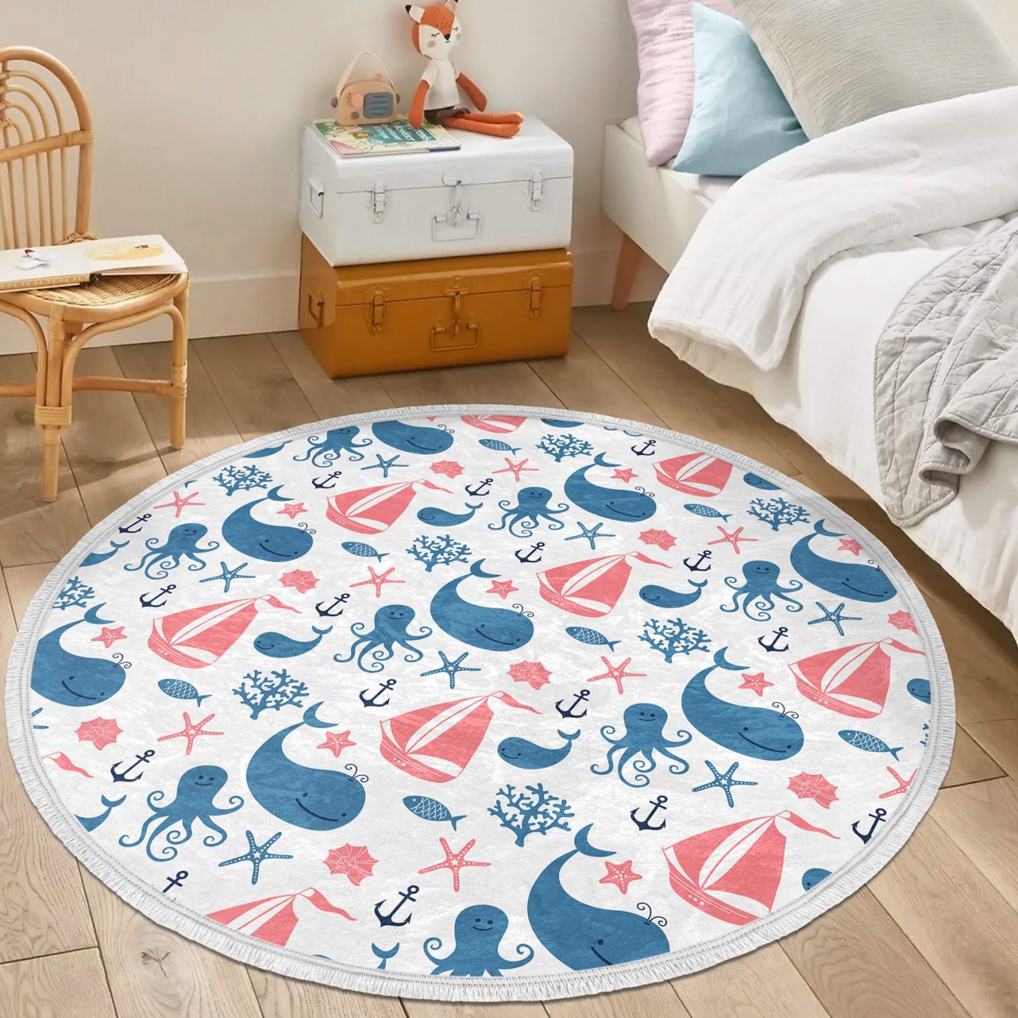 Whale printed round rug designed for nursery rooms, featuring a vibrant marine design and soft velvet fabric.