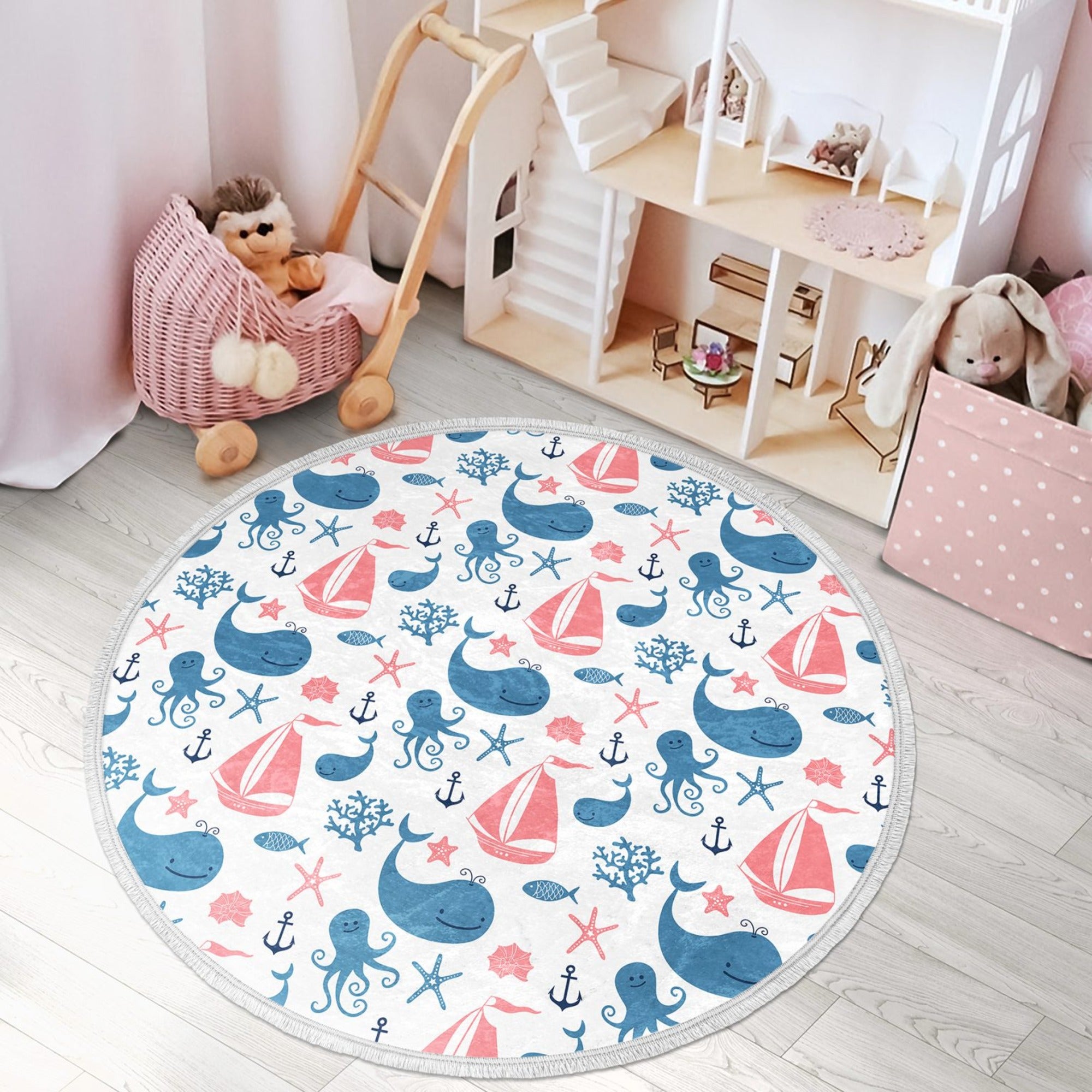Whale printed round rug designed for nursery rooms, featuring a vibrant marine design and soft velvet fabric.