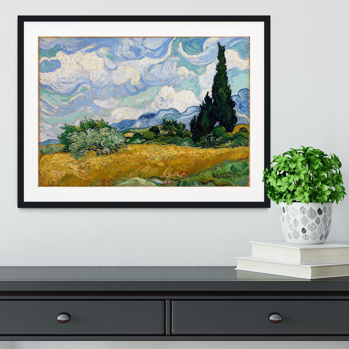 Framed print of Wheat Field with Cypresses by Van Gogh, showcasing vibrant colors and intricate details in a handmade frame.