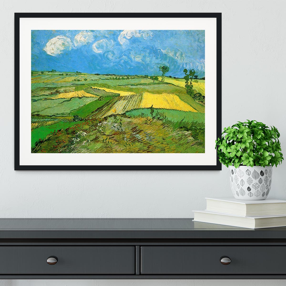 Framed print of Wheat Fields at Auvers Under Clouded Sky by Van Gogh, showcasing vibrant colors and dynamic brush strokes.