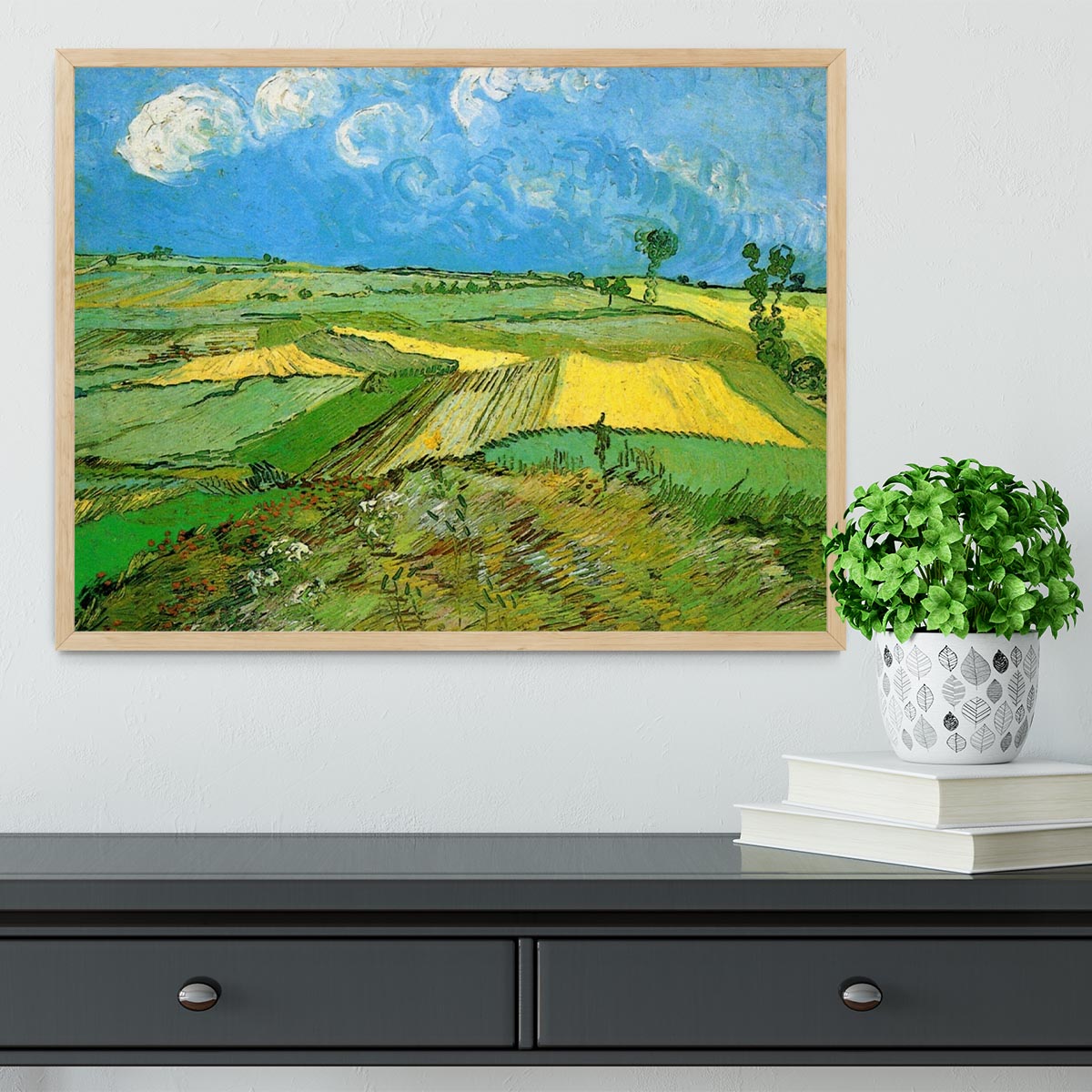 Framed print of Wheat Fields at Auvers Under Clouded Sky by Van Gogh, showcasing vibrant colors and dynamic brush strokes.