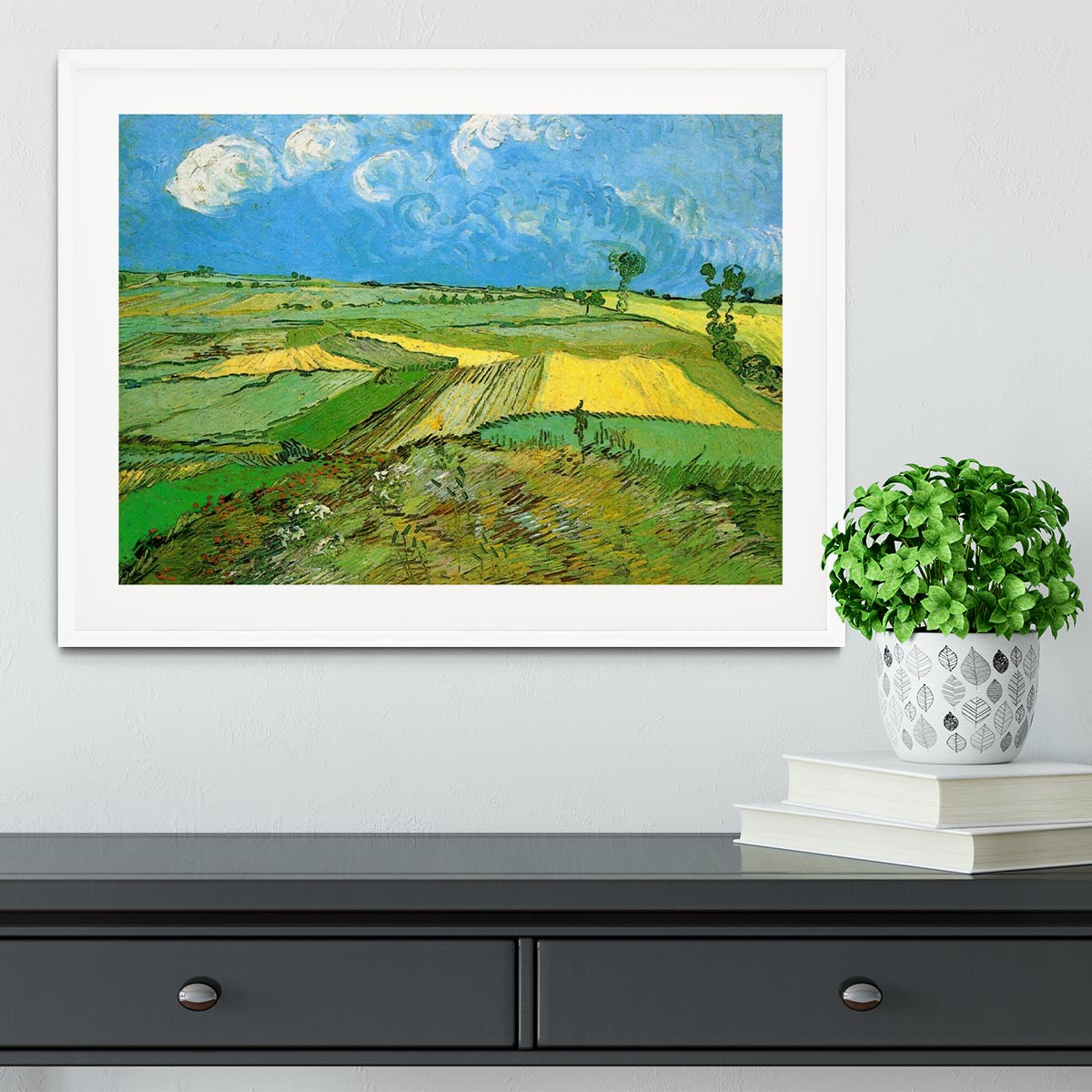 Framed print of Wheat Fields at Auvers Under Clouded Sky by Van Gogh, showcasing vibrant colors and dynamic brush strokes.