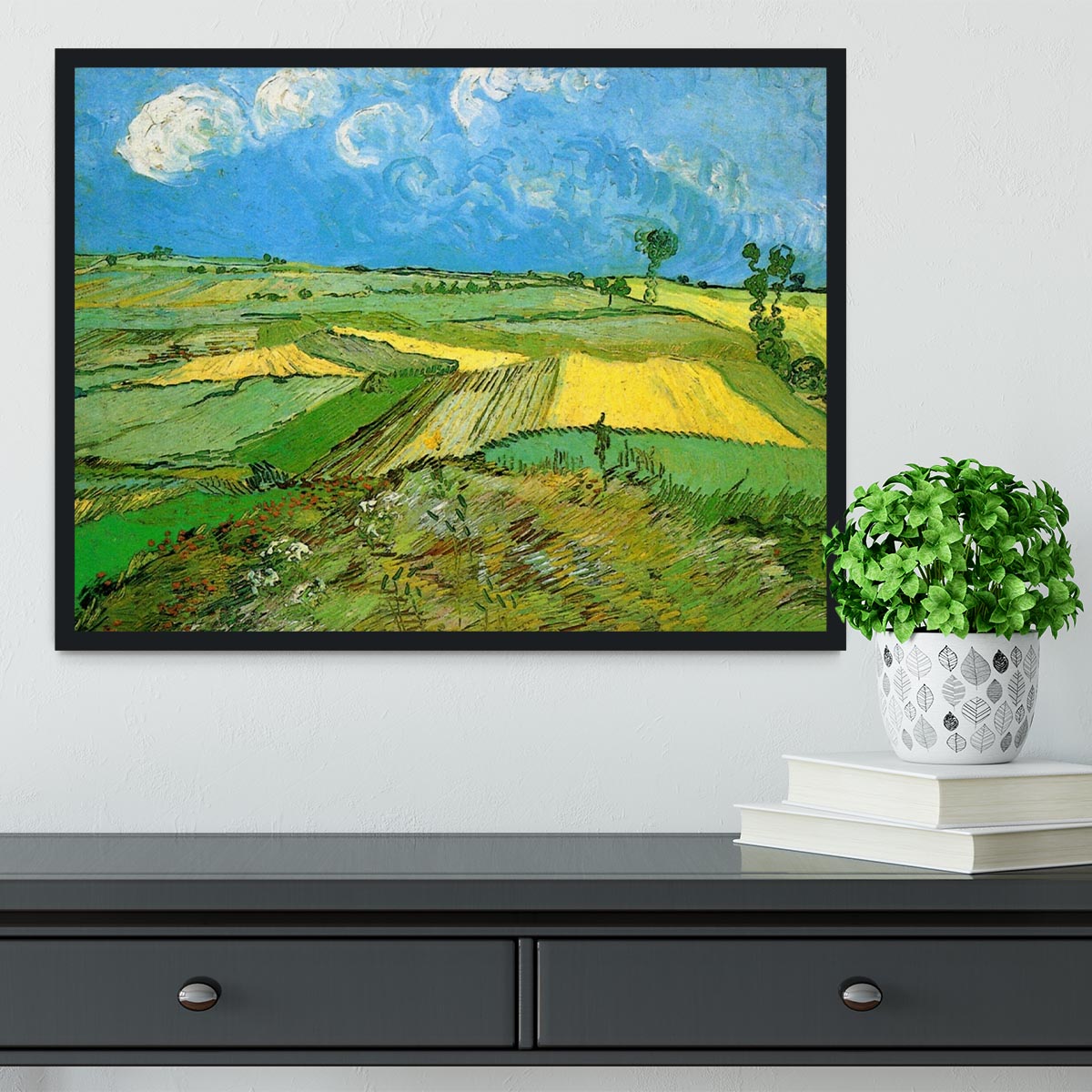 Framed print of Wheat Fields at Auvers Under Clouded Sky by Van Gogh, showcasing vibrant colors and dynamic brush strokes.