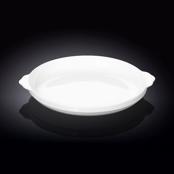 A 9-inch oval white baking dish made of fine porcelain, showcasing its elegant design and sturdy construction.