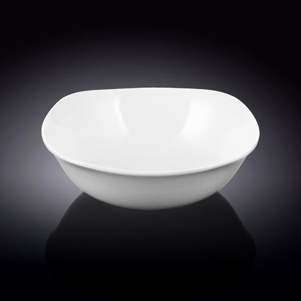 A 6.5-inch white porcelain bowl, perfect for serving soups, salads, and pasta, showcasing its classic round design and rolled rim.