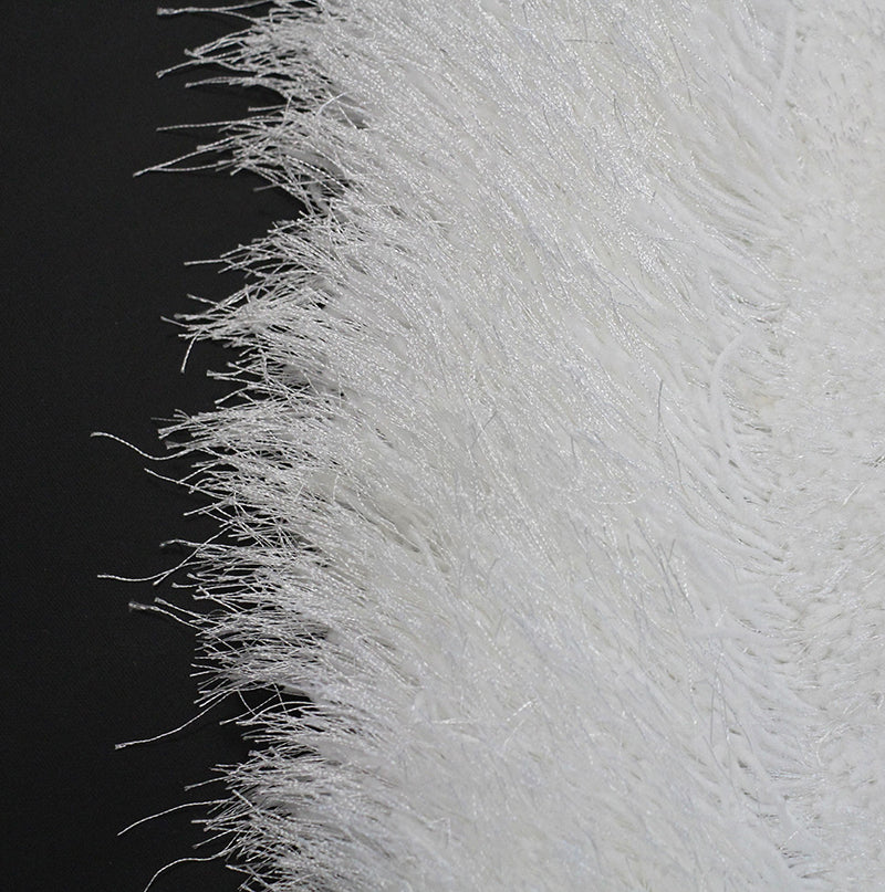 White Double Heart Decorative Area Rug with soft shaggy texture, hand tufted design, and cotton backing, perfect for enhancing home decor.