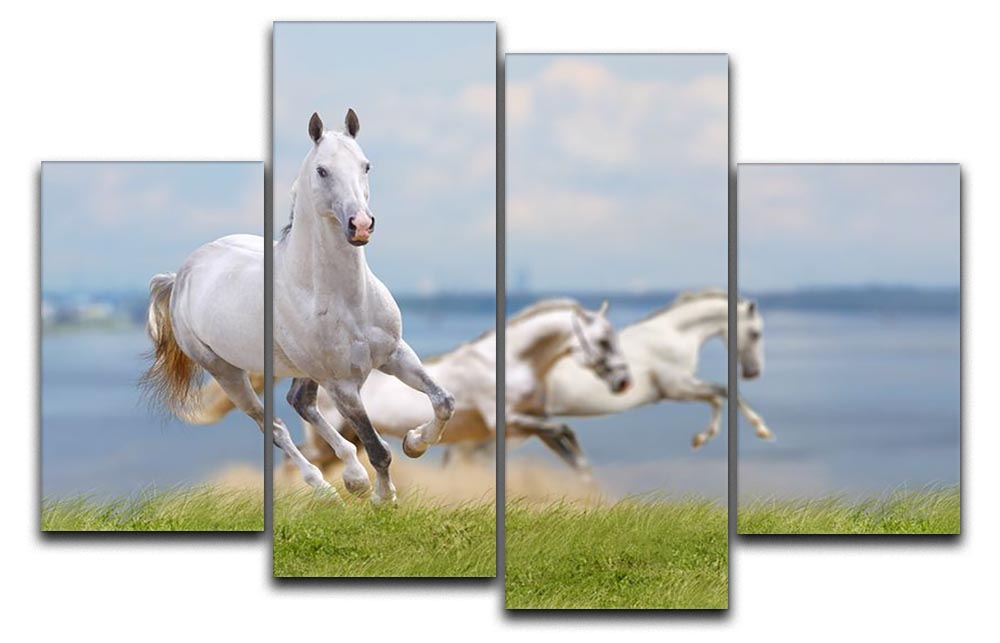 A beautiful 4-split canvas artwork depicting white horses running near a tranquil water body, showcasing dynamic movement and nature's beauty.