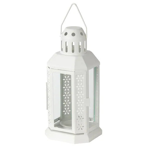 A white metal miners lantern designed for tealight candles, featuring a solid loop for hanging, perfect for weddings and home decor.