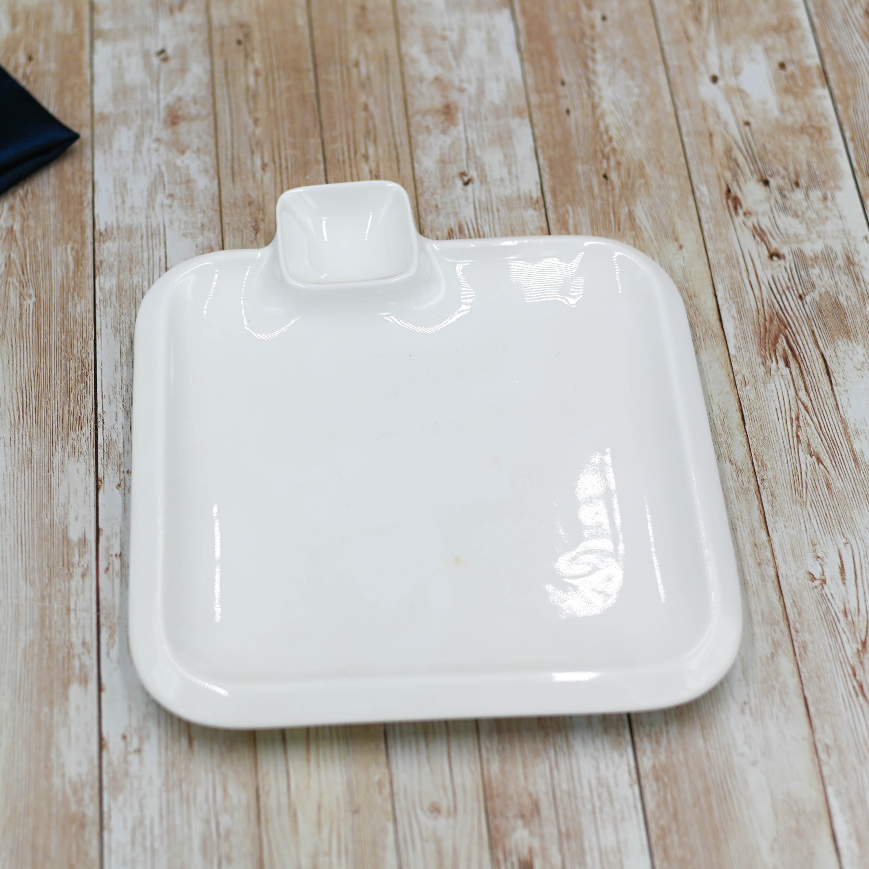 Wilmax White Square Platter with Sauce Compartment, 10x10 inches, elegant porcelain design for serving various dishes.