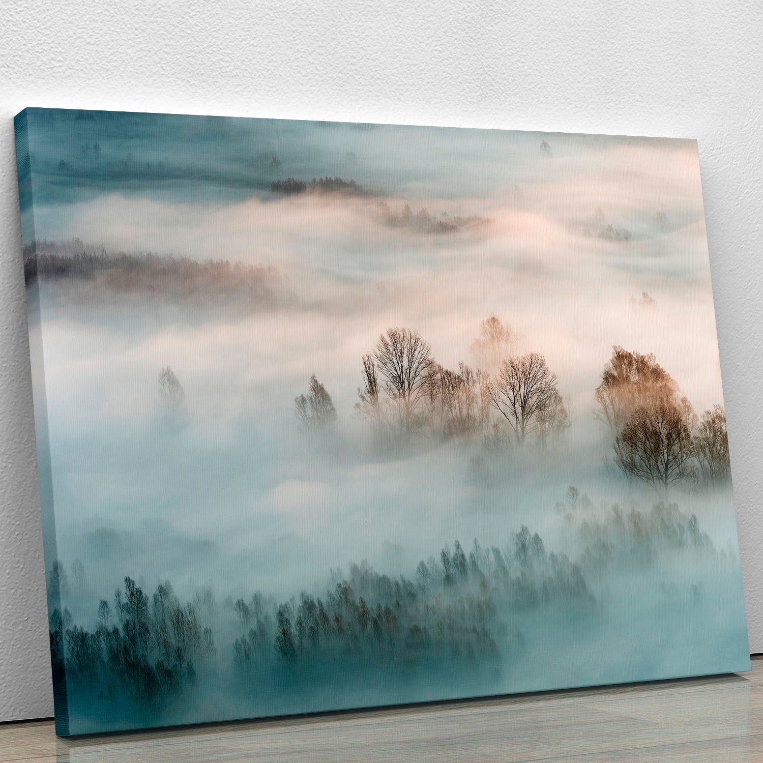 A beautiful canvas print featuring a serene winter fog landscape, showcasing soft hues and a tranquil atmosphere.