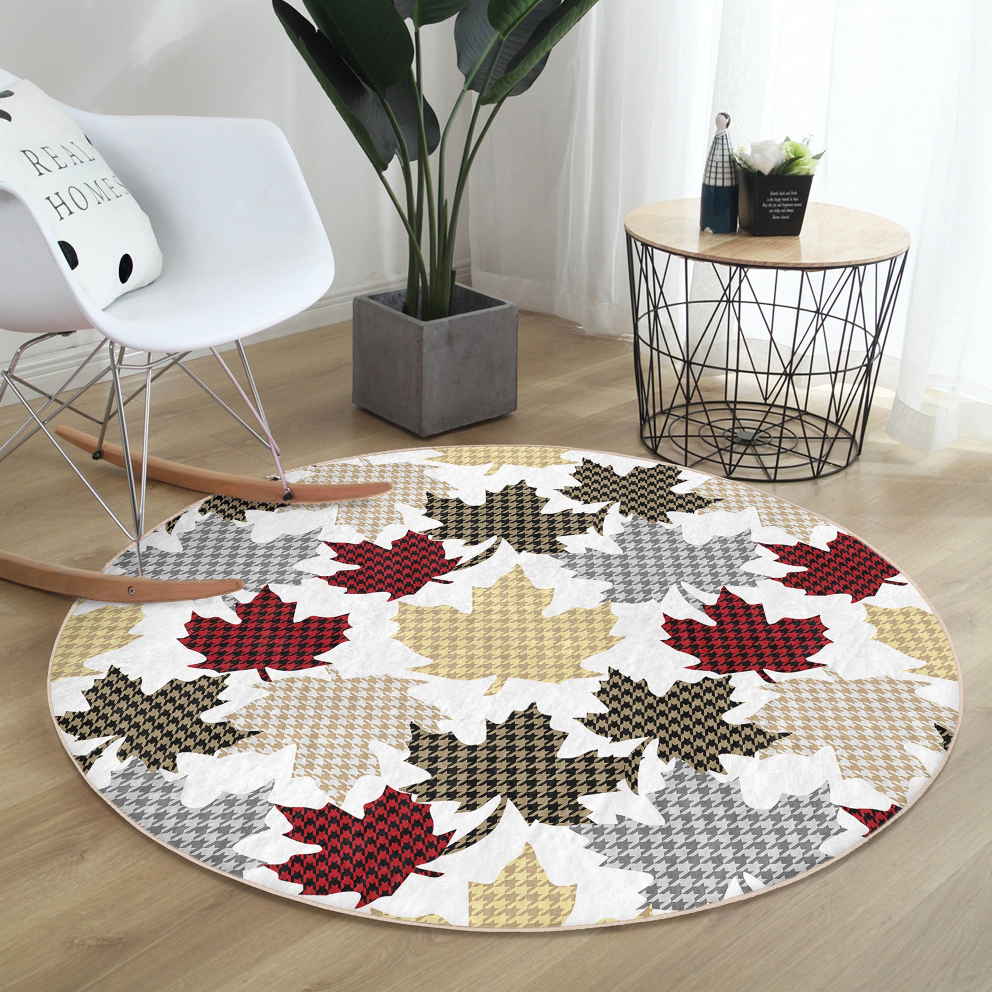 A cozy round rug featuring a vibrant maple leaf pattern, perfect for winter home decor, showcasing rich colors and soft texture.