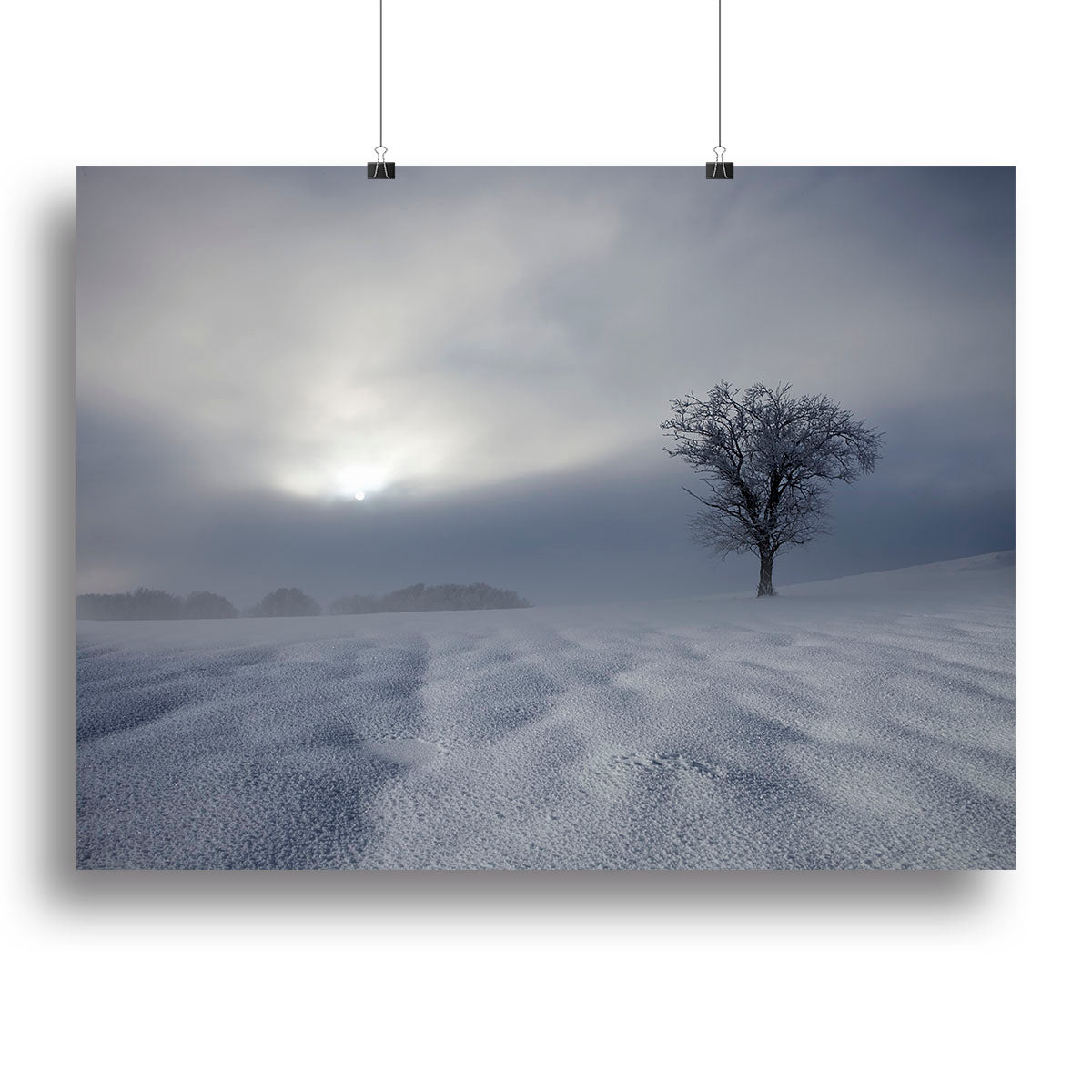 A beautiful Winter Impression Canvas Print showcasing a serene winter landscape with snow-covered trees and a tranquil atmosphere.