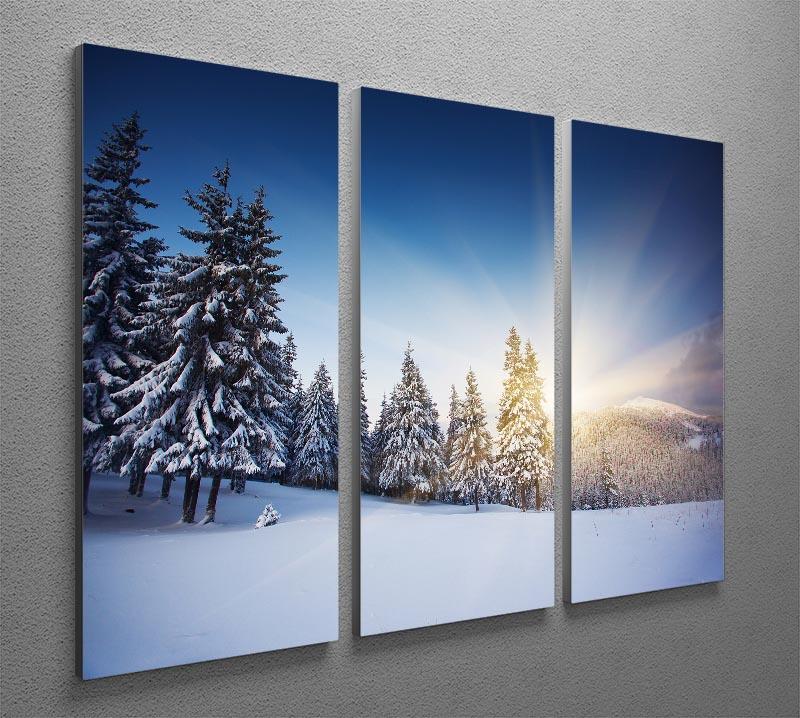 A beautiful winter mountains landscape depicted in a 3-panel canvas print, showcasing snow-covered peaks and serene scenery.