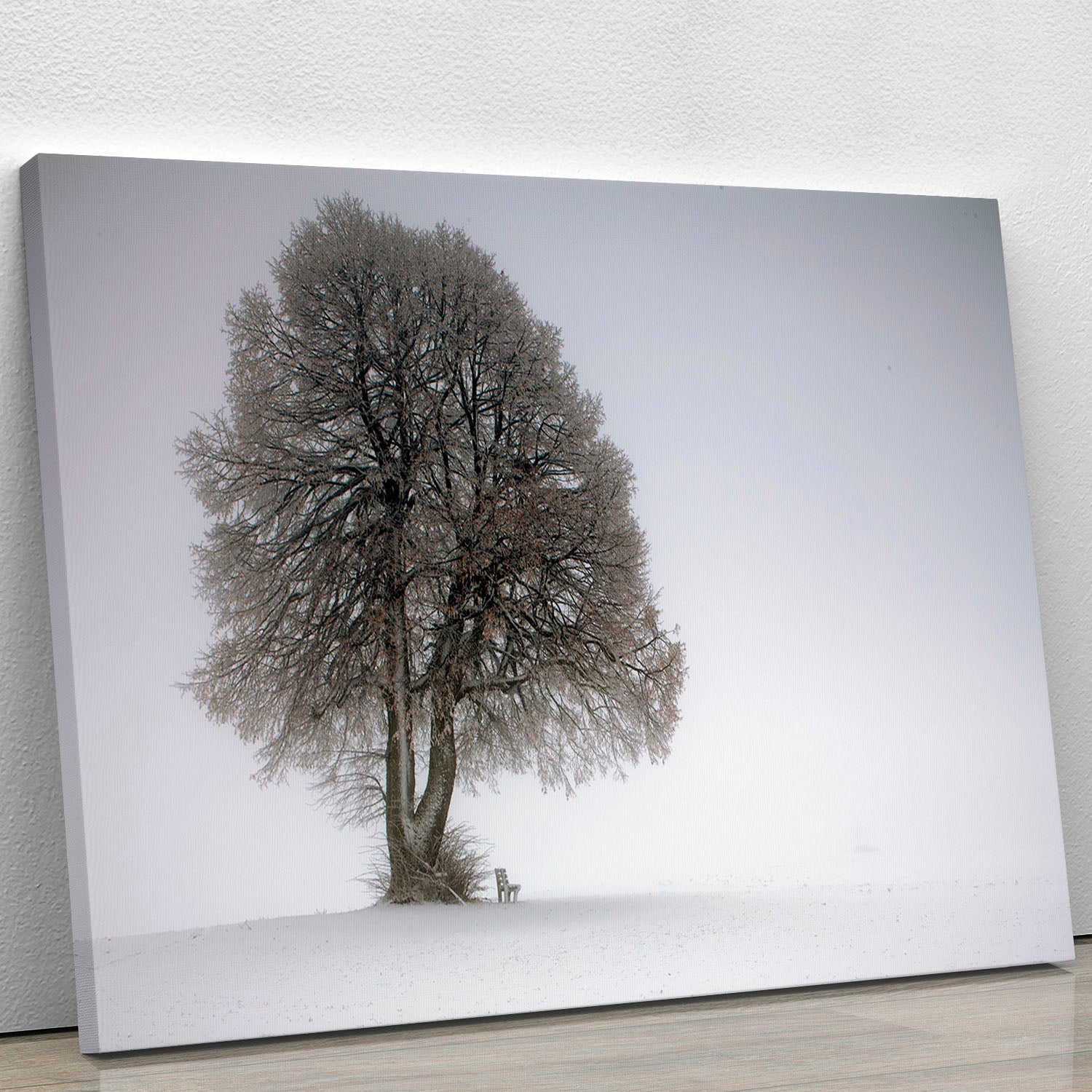 A beautiful winter tree canvas print showcasing a serene snowy landscape, perfect for home decor.