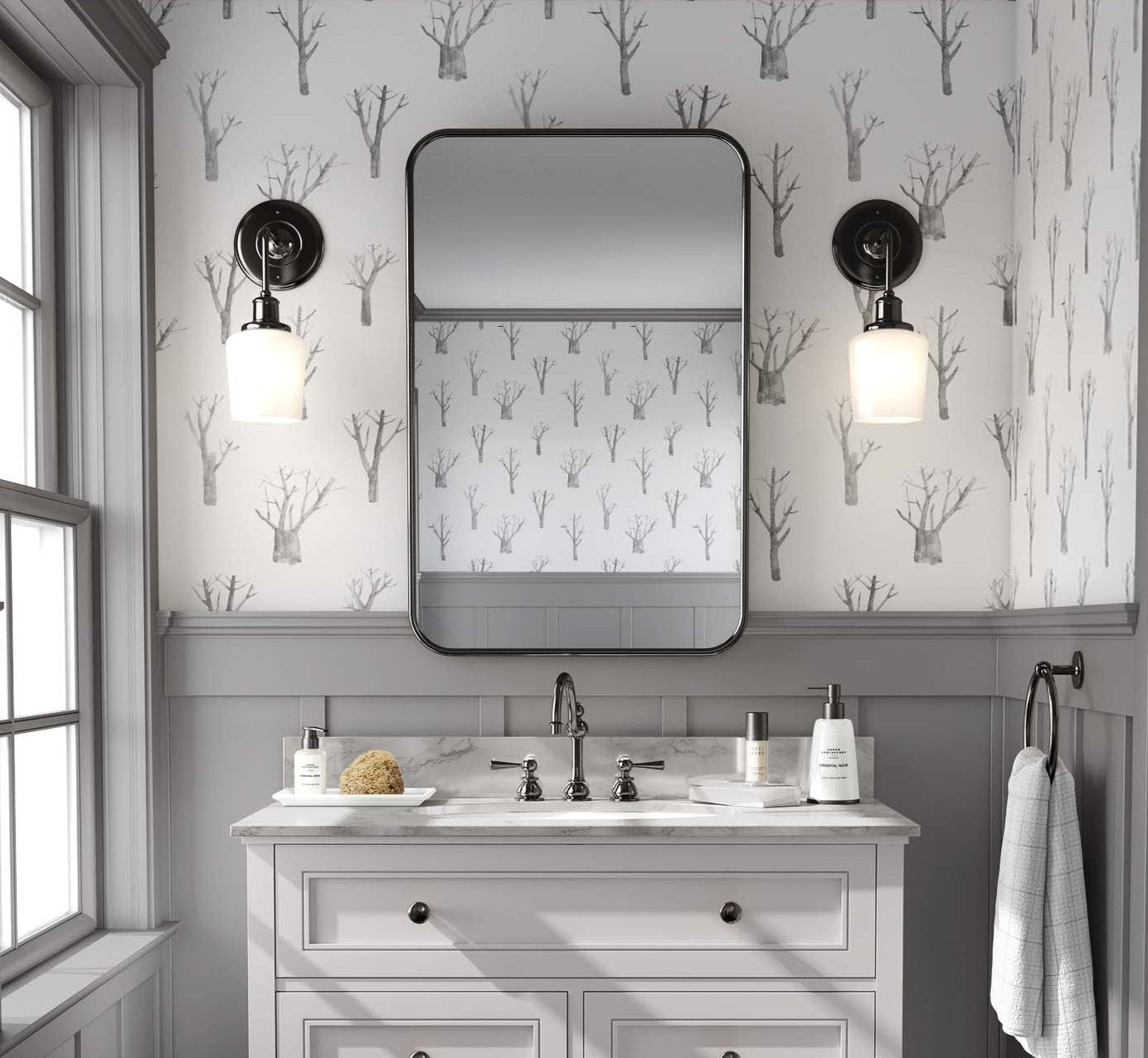 Elegant winter trees wallpaper in soothing white and grey tones, perfect for nursery bedrooms.