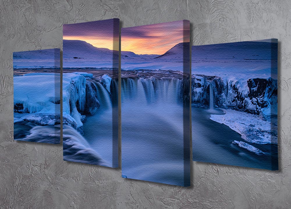 A beautiful 4-split canvas artwork depicting a serene winter waterfall scene, showcasing four panels that create a cohesive image.