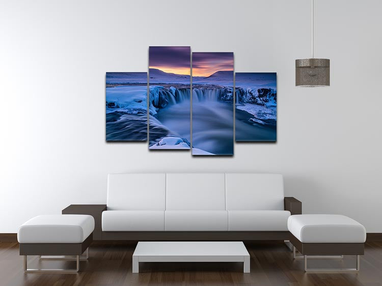 A beautiful 4-split canvas artwork depicting a serene winter waterfall scene, showcasing four panels that create a cohesive image.
