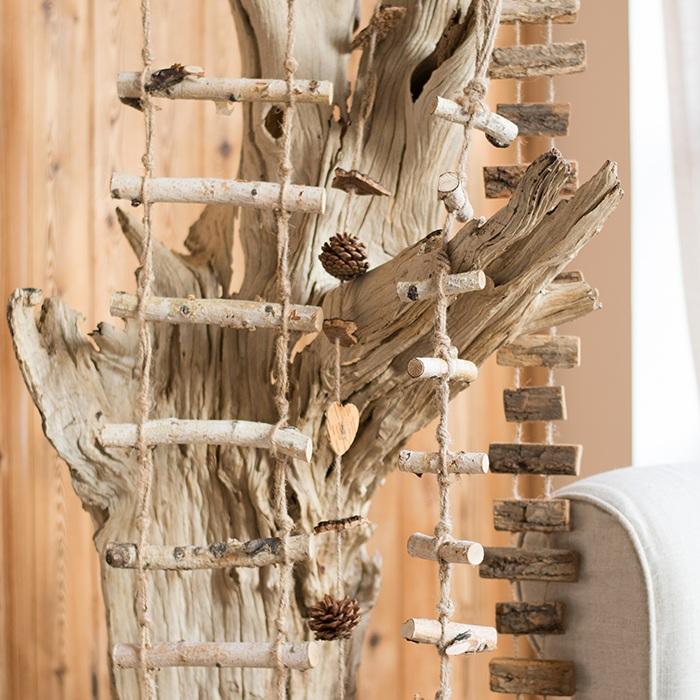 Handmade Wood String Ornament featuring natural materials like birch and tree bark, showcasing unique designs and earthy colors.