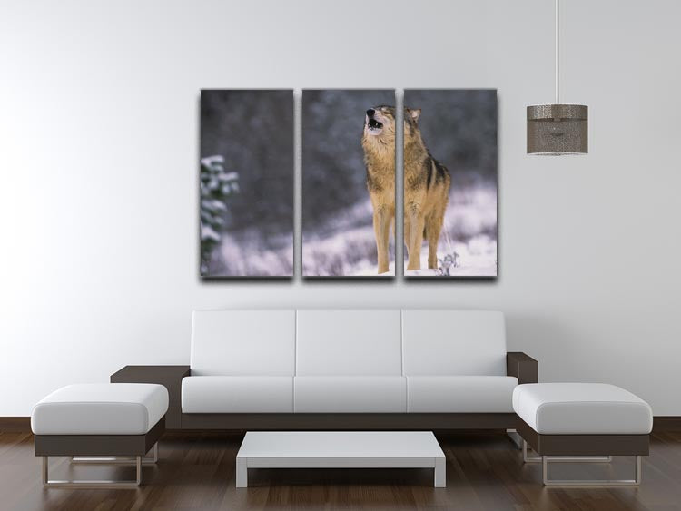 A captivating 3-panel canvas print featuring a wolf howling in a snowy landscape, perfect for home decor.