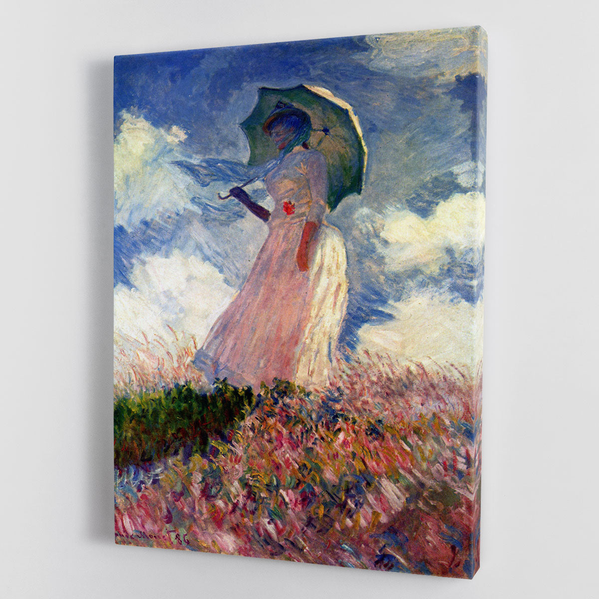Canvas print of Woman with Parasol by Monet, showcasing a woman with a parasol in a vibrant natural setting.