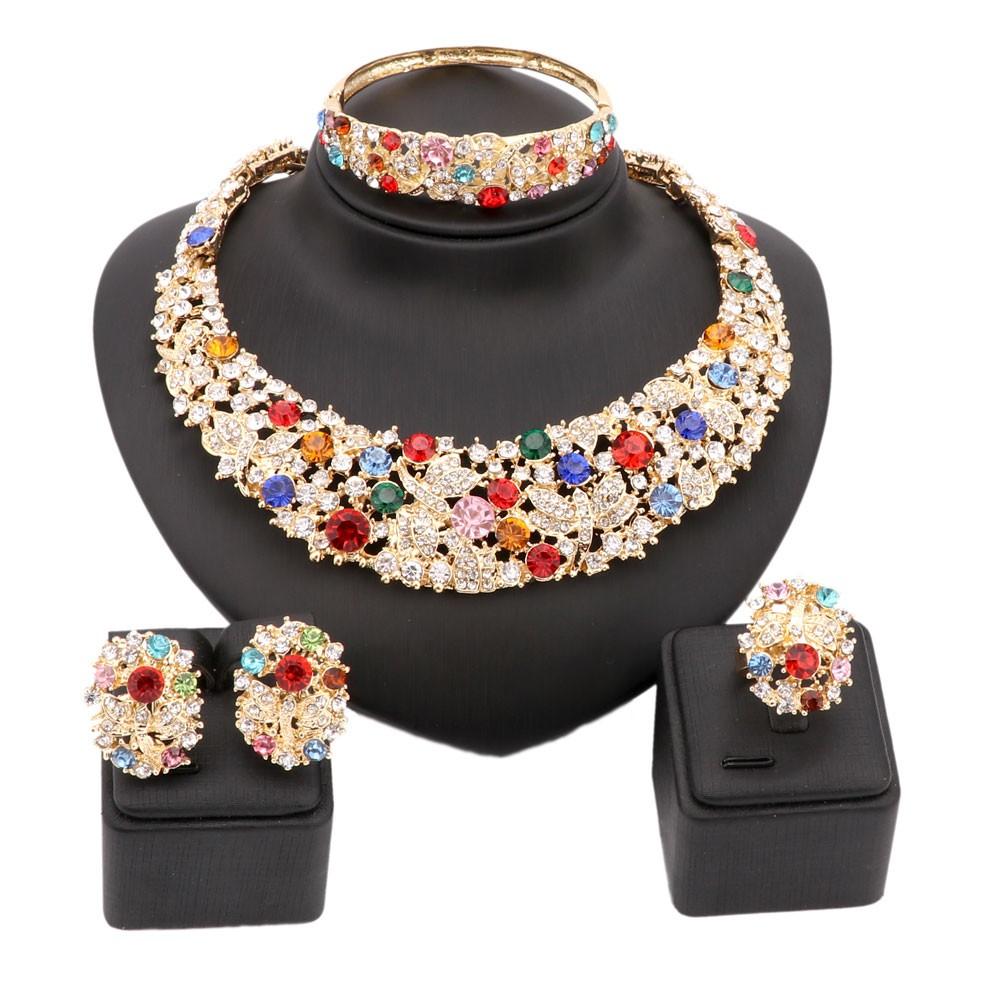 Colorful rhinestone jewelry set featuring African beads, perfect for weddings and parties, showcasing intricate designs in gold and silver plating.