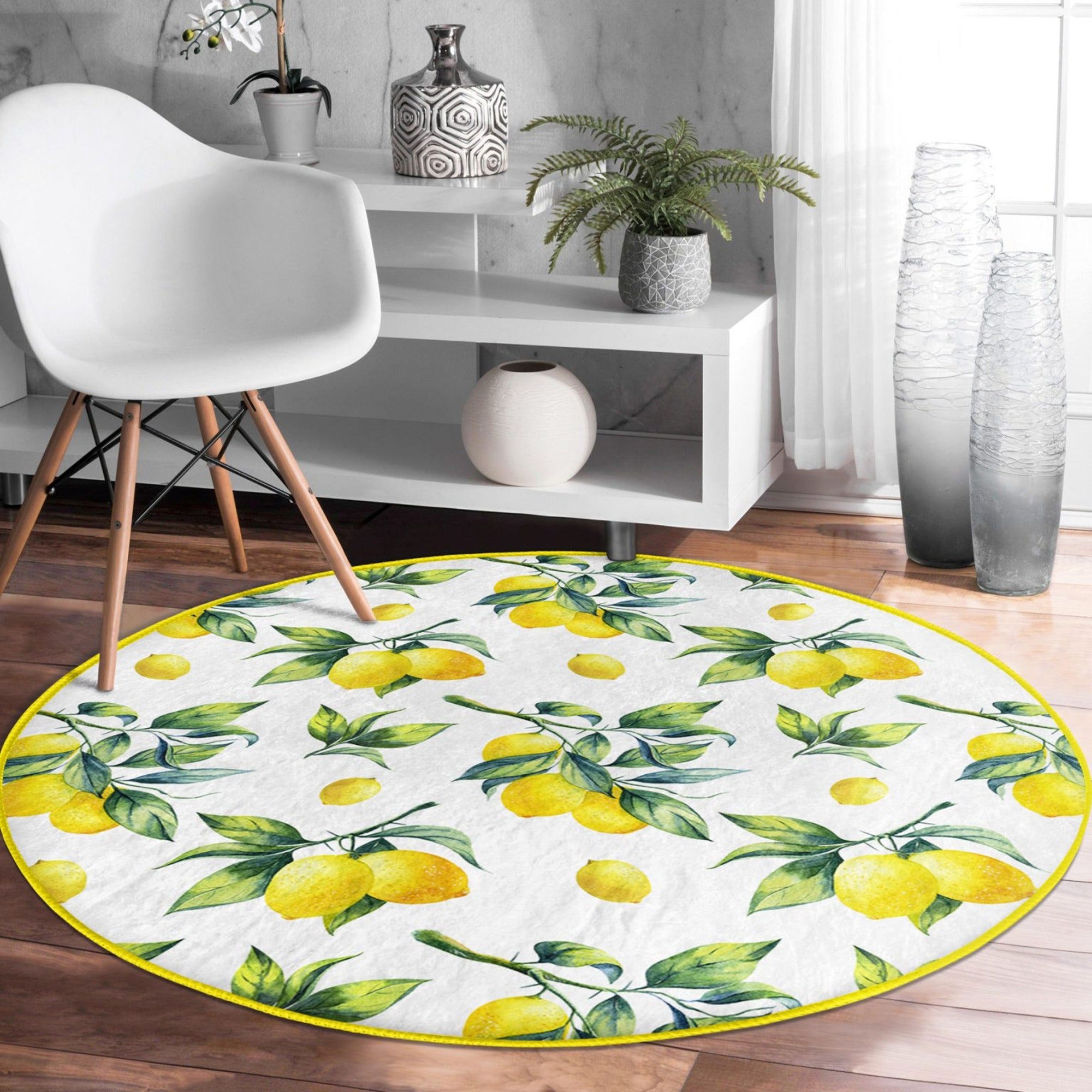 A vibrant round rug featuring a cheerful yellow lemons pattern, perfect for summer home decor.