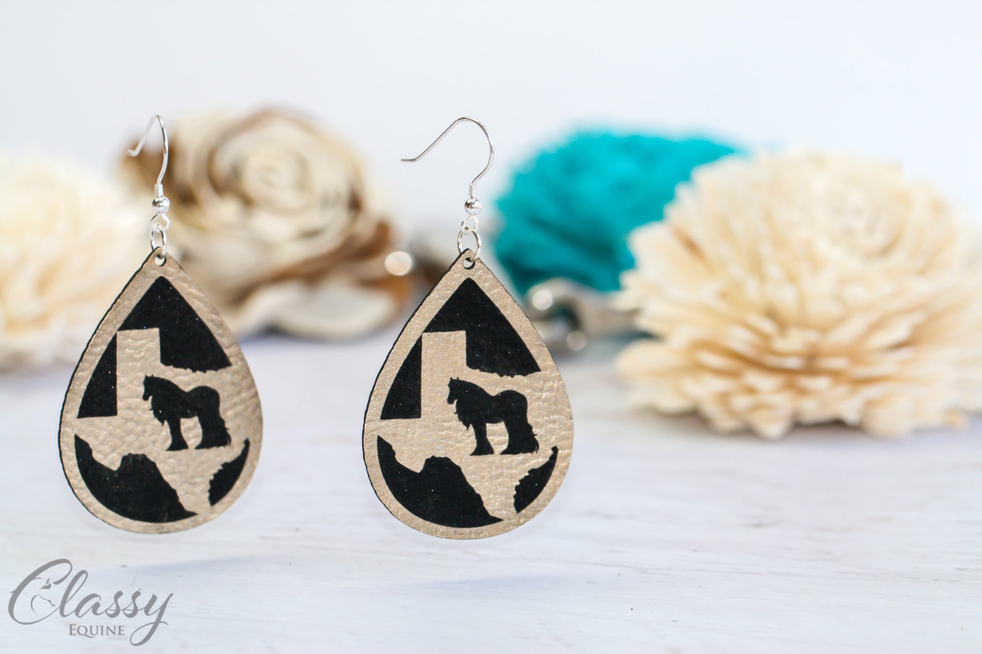 Customizable dangle earrings featuring horse breed silhouette and state design, made from lightweight faux leather with sterling silver findings.